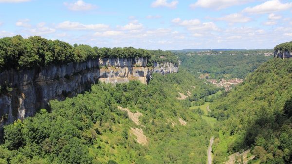 The limestone cliffs of the reculée, like a jewel case around the village